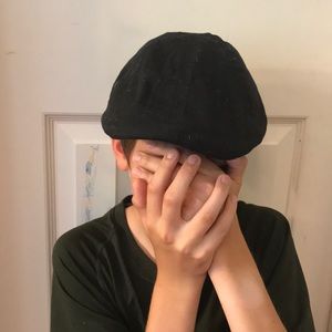 black flat hat with a visor